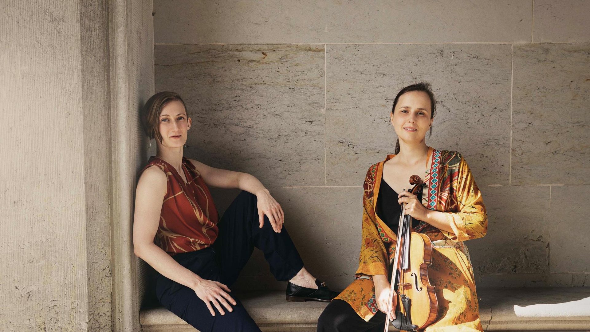 Aegira Duo performing — banner photograph